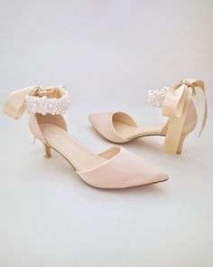 Champagne Satin Pointy Toe Low Heels with Perla Strap, Bridal Shoes Elegant Pearl Ankle Strap Wedding Shoes, Elegant Pearl Wedding Shoes With Ankle Strap, Elegant Wedding Shoes With Satin Bow For Bridal Shower, Feminine Wedding Heels With Satin Bow, Pearl Wedding Shoes With Pointed Toe, Feminine Wedding Shoes For Guests, Elegant Cream Wedding Shoes With Pearl Embroidery, Feminine Low Heel Wedding Guest Shoes, Elegant Cream Kitten Heels For Wedding