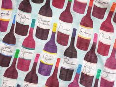 a table cloth with wine bottles on it