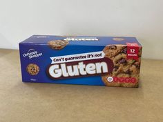 a box of gluten cookies sitting on top of a counter