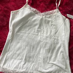 White Christopher & Banks Lace Trimmed Camisole Nwt. Excellent Condition. Smoke Free And Pet Feee Home. Sale! All Items With In The Description Are Three For $10. Create A Bundle And Make An Offer! * Up To 5 Pounds Elegant White Tank Top With Straps, Elegant White Top With Tank Straps, Feminine White Top With Built-in Bra, White Camisole Tank Top For Daywear, Elegant Cotton Top With Tank Straps, White Spaghetti Strap Tank Top For Daywear, White Cami Tank Top With Lace Trim, Stretch Camisole Tops For Daywear, White Fitted Camisole Top