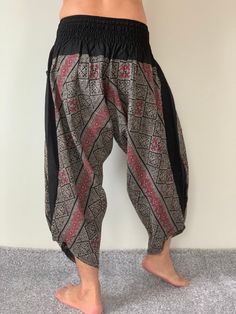 "Mens Japanese Samurai Style Japanese Casual, Harem Baggy Hakama cotton Pants Samurai Pants - elastic waistband Fits all! Unisex pants These beautiful casual pants is unique & comfortable to wear Handmade with a very lovely pattern, it is easy to wear and great for many occasions. One size fits most. These pants are great for many different activities like traveling, dancing, going to festivals, rock climbing, yoga, meditation, massage, working out, martial arts, Taichi MATERIAL: 100% Cotton Cotton Harem Pants With Elastic Waistband For Meditation, Traditional Relaxed Fit Wide Leg Harem Pants, Traditional Pants With Elastic Waistband For Festivals, Traditional Cotton Bottoms For Meditation, Traditional Baggy Cotton Bottoms, Traditional Relaxed Fit Harem Pants For Yoga, Traditional Harem Pants For Meditation, Traditional Wide Leg Cotton Yoga Pants, Traditional Wide Leg Harem Pants For Meditation