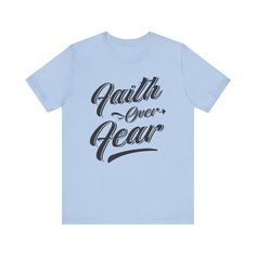 This classic unisex 'Faith Over Fear' jersey short sleeve tee offers the comfort of a well-loved favorite. Crafted from soft cotton with a high-quality print, this shirt is one you'll reach for again and again. It features ribbed knit collars for enhanced shape retention and tapered shoulders for a fit that improves over time. Dual side seams ensure lasting durability, keeping the tee in shape longer. Ideal for both active and leisure wear, it provides a versatile retail fit that suits casual and semi-formal occasions. The crew neckline adds a timeless, polished touch, perfect for pairing with your favorite accessories. Product Details: .: Made with 100% Airlume combed and ring-spun cotton, a lightweight fabric (4.2 oz/yd² (142 g/m²)) that is easy to layer, breathable. .: Bella+Canvas manu Relaxed Fit Short Sleeve Shirt With Lettering, Relaxed Fit T-shirt With Lettering, Inspirational Short Sleeve T-shirt For Summer, Blue Short Sleeve Tops With Lettering, Inspirational Short Sleeve Summer T-shirt, Relaxed Fit Short Sleeve T-shirt With Lettering, Inspirational Short Sleeve T-shirt For Streetwear, Relaxed Fit T-shirt With Lettering, Short Sleeve, Inspirational Short Sleeve Streetwear T-shirt