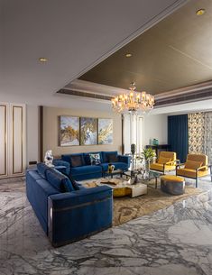 a living room filled with furniture and a chandelier hanging from the ceiling over a marble floor