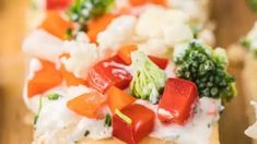 there are many different types of food on the table together, including broccoli and cauliflower