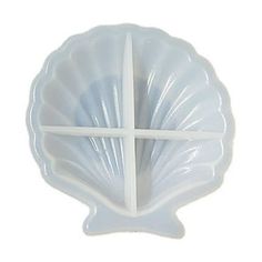 a plastic shell with a cross on it