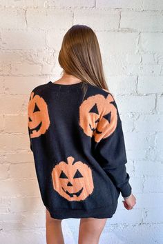 Celebrate the season in style with the Pumpkin Cutie Sweater from Adeline Boutique. This adorable sweater features a charming pumpkin graphic that adds a playful touch to your autumn wardrobe. Crafted from soft, high-quality fabric, it provides both warmth and comfort during cooler months. Perfect for casual outings or cozy days in, the Pumpkin Cutie Sweater pairs effortlessly with jeans, leggings, or skirts. Fabric: 58% Acrylic, 27% Polyester, 15% Nylon Model Meet Claire! Height: 5’7" Hips: 31. Fall Wardrobe, Black Sweaters, Quality Fabric, Rompers, Leggings, Boutique, Wardrobe, Celebrities, Fabric