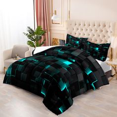 a bed covered in black and green comforters