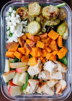 a plastic container filled with vegetables and meats next to the words fall harvest meal prep