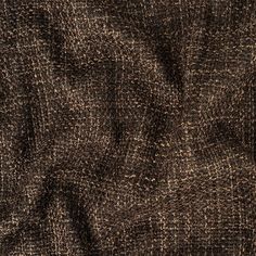 an up close shot of a brown and black textured fabric material that is very soft