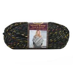 the wool - ease yarn is black, yellow and gray with multicolored stripes