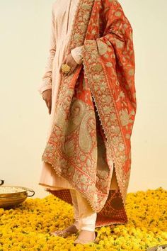 Pumpkin orange dupatta with Kashmiri tilla embroidery in floral and paisley motifs hem.
Component: 1
Pattern: Embroidered
Type Of Work: Tilla
Fabric: Raw Silk
Color: Orange
Other Details: 
Note: Kurta and pant worn by the model is not for sale
Occasion: Wedding,Mehendi - Aza Fashions Sheetal Batra, Kashmiri Tilla Embroidery, Tilla Embroidery, Best Designer Suits, Velvet Dupatta, Haldi Outfits, Lace Suit, Angrakha Style, Traditional Attires