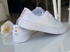 "Stunning bridal Converse, embellished with romantic ribbon lace for your perfect day, Personalised wedding shoes for the wedding day and beyond. Custom Converse with the option to add a perfectly colour matched ribbon. - Upper piece of durable canvas fabric - Classic toe cover made of cast rubber sole - All Star logos on the back of the sole and the inside - They are tied at the highest point of the shoe, flattening the foot inside the shoe Tip: Converse's size is a smaller number than other co Lace-up Wedding Shoes For Bride, Lace-up Wedding Shoes For Ceremony, White Lace-up Wedding Shoes, Lace-up Wedding Shoes With Laces For Bride, White Low-top Wedding Shoes For Bride, White Low-top Wedding Shoes, White Sneakers With Laces For Bridal Shower, Lace-up Wedding Shoes With White Laces, White Low-top Wedding Shoes For Bridal Shower