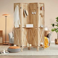 a room divider in the middle of a living room with furniture and accessories on it