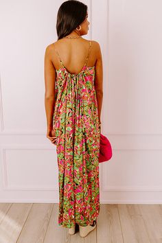 - Let your fashion sense bloom in this beautiful jumpsuit! - Lightweight, satin material with a colorful abstract floral design - Scoop neckline with drawstring spaghetti straps with back tie closure - Hidden side pockets - Ultra relaxed silhouette that ends in straight floor length hemlines Multicolor V-neck Jumpsuits And Rompers With Tropical Print, Vibrant V-neck Maxi Dress With Floral Print, Multicolor Printed Maxi-length Jumpsuits And Rompers, Beautiful Jumpsuits, Abstract Floral Design, Multicolor Vibrant Print V-neck Maxi Dress, Multicolor Abstract Print V-neck Maxi Dress, Satin Material, Colorful Abstract