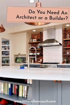 a kitchen with an island and bookshelves in the center, which reads do you need an architectural or a builder?