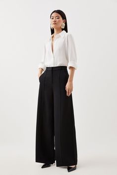 Experience Sleek Tailoring In A Pair Of Wide Leg Trousers, Featuring A Dramatic And Ultra Comfortable Wide Leg Fit And A Comfortable High Waistline. Style It With A Shirt, And Heels For A Dressy Look Perfect For Office Days And Formal Events, Then With A T-Shirt And Trainers For A More Laid Back Approach. Premium Woven Viscose Crepe Wide Leg Trouser High Quality Cepe Fabric Comfortable High Waistline Statement Wide Leg Fit Classic Pleat Detailing Pocket Accents Wide Leg Womens Dress Pants, All Black Outfit Wide Leg Pants, Wide Leg Pants Cocktail Outfit, Pleated Black Pants Outfit, High Fashion Office Wear, Gothic Business Casual Corporate Goth, Wide Leg Work Outfit, Wide Leg Slacks Outfit, Black Wide Leg Pants Outfit Work