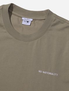 a t - shirt that says no nationality on it