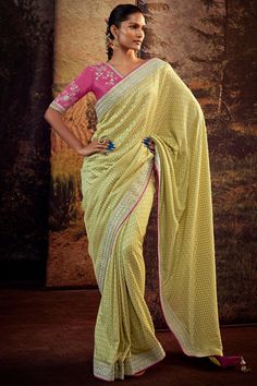 Elevate your wardrobe with this stunning Art Silk Saree. The beautiful fabric and intricate detailing are sure to turn heads at any function. The saree comes with a contrast blouse piece, allowing you to customize the look to your liking. The lightweight material makes it easy to wear and move around in. Stand out from the crowd and show off your impeccable style in this saree. Pista Green Cotton Silk Pre-draped Saree, Eid Pista Green Dola Silk Pre-draped Saree, Eid Anarkali Pre-draped Saree With Pallu, Festive Bollywood Pre-draped Saree With Pallu, Anarkali Pre-draped Saree With Zari Work For Puja, Pista Green Cotton Silk Pre-draped Saree With Cutdana, Unstitched Pista Green Cotton Silk Pre-draped Saree, Cotton Silk Blouse Piece For Eid With Traditional Drape, Traditional Drape Cotton Silk Blouse Piece For Eid