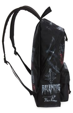 It's volume up on your metal-head aesthetic with this canvas backpack tagged in gothic-fonted brand graffiti and punctuated with lug-nut and barbell piercings. Two-way top-zip closure Top carry handle; adjustable backpack straps Exterior zip pocket Interior zip and patch pockets Textile Made in Italy Grunge Backpack For Streetwear, Grunge Streetwear Backpack, Black Punk Backpack For Streetwear, Punk Black Backpack For Streetwear, Alternative Streetwear Backpack, Alternative Style Backpack For Streetwear, Punk Style Standard Backpack For Streetwear, Punk Streetwear Standard Backpack, Punk Style Streetwear Standard Backpack