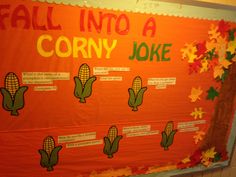 an orange bulletin board with corn on the cob and fall into a corny joke