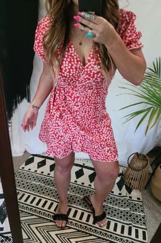 “Where you are is where I want to be”- Anonymous Be a total smokeshow this summer. Our stunning red floral sun mini dress is perfect for any date night or any sundee fundee. This adorable dress features swiss dot details, a deep-v cut neckline with a ruffled hem, short puff sleeves with a ruffled hem, side tie details, and is totally hot and perfect for a boheme babe like you. Style this dress with any of our Wide Brims to instantly elevate your style. Runs a little smaller in size, order 1 up! Where I Want To Be, Red Wrap Dress, Girl Vibe, Cowgirl Chic, I Want To Be, Swiss Dot, Country Girl, V Cuts, Wide Brimmed