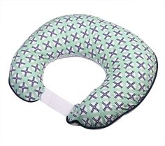 the neck pillow is green and white with black lines on it, which are attached to an