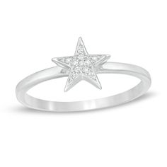 She'll love the simply stellar style of this dreamy diamond accent ring. Crafted in sterling silver, this spirited choice showcases a sculpted star shimmering with diamond accents. Polished to a bright shine, this design is an irresistible eye-catcher. This ring is available in select sizes only. Sterling silver rings cannot be resized after purchase. Star-shaped Diamond Ring With Single Diamond For Anniversary, Celestial Star-shaped Diamond Anniversary Ring, Celestial Silver Diamond Ring For Anniversary, Celestial Star-shaped Diamond Ring For Anniversary, Celestial Silver Diamond Ring With Accents, Sterling Silver Star Jewelry With Diamond Accents, Sterling Silver Star Jewelry With Prong Setting, Sterling Silver Star-shaped Jewelry With Prong Setting, Celestial Style Silver Diamond Ring With Accents