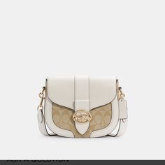 This Coach Georgie Saddle Bag Is A Stylish And Functional Accessory For Any Woman. The Bag Is Made Of Chambray And Leather In A Light Khaki Chalk Color, With A Gold Magnetic Closure And Gold Hardware. It Features A Crossbody Strap That Can Be Adjusted And A Detachable Strap, As Well As Inner Pockets And A Bag Charm. The Bag Is Lined With Fabric And Has A Small Size, Measuring 8 1/4 Inches In Width, 6 3/4 Inches In Height, And 2 3/4 Inches In Depth. The Bag Is Suitable For Travel, Casual Outings, Elegant Luxury Coach Saddle Bag, Luxury Elegant Coach Saddle Bag, Coach Georgie, Bag Light, Functional Accessories, Saddle Bag, Designer Bag, A Bag, Crossbody Strap