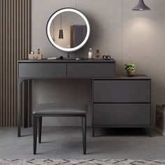 a vanity with a mirror and stool in a room