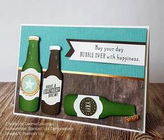 a card with two beer bottles and a sign that says may your day bubble over, wish - happiness