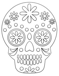 a sugar skull with flowers on it's face, outlined in black and white