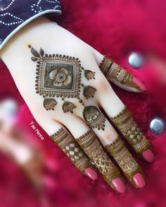 hendi designs for hands and feet with intricate details on the top half of the hand