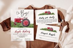 three farm themed baby shower cards on top of a brown sweater