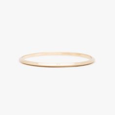 This triangular-shaped wire makes a beautiful "knife-edge" bangle. This subtle pointed shape adds dimension and shine. A 4mm x 3.5mm solid 14k gold bangle. Modern 14k Gold Hoop Bangle, Minimalist Yellow Gold Round Band Bracelet, Minimalist 14k Gold Bangle For Formal Occasions, Minimalist Hoop Bangle In Yellow Gold, Minimalist 14k Gold Bracelet With Polished Finish, Minimalist 14k Gold Wedding Bangle, 14k Gold Stackable Bangle, Minimalist Stackable Hoop Bangle, Minimalist Stackable Rose Gold Bangle