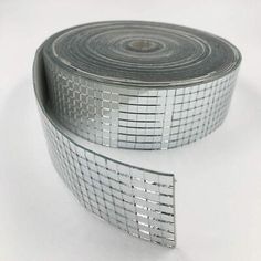 two rolls of silver duct tape on white background