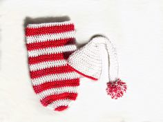 Baby Candy Cane Crochet Swaddle  * Size: 0-3 Months  * 2 piece set ( Long Hat + Baby Swaddle ) * Perfect For First Christmas Pictures. * Handmade with Love Crochet Christmas Elf, Crochet Swaddle, Christmas Elf Hat, Long Hat, Cap Baby, Baby Candy, Elf Hat, Baby Cap, Crochet Christmas