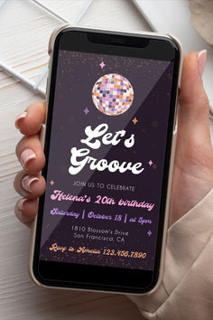 a person holding an iphone with the text let's groove on it