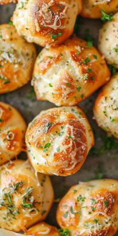 small rolls with cheese and herbs on top