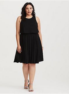 Crafted in a stretchy black ponte fabric, this twofer midi dress features a tank top overlay and a pleated skirt. Ponte fabric Sleeveless Round neck Zipper back Midi length CONTENT + CARE Rayon/nylon/spandex; Lining: polyester Wash cold; line dry Imported SIZE + FIT Model is 5'10" and wearing a Size 1 Size 1 measures 41" from shoulder to hem Modest Work Outfits, Affordable Plus Size Clothing, Perfect Little Black Dress, Mama Style, Plus Size Black, Deep Black, Dress Backs, Plus Size Clothing, Pleated Skirt