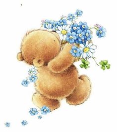 a brown teddy bear holding blue flowers