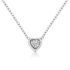 Haven’t we all had the dream of getting ready like a queen for that special day. This heart shaped diamond pendant necklace is designed for that queen in you. This 10k white gold pendant is studded with a single 1/10 carat round-cut diamond and is a magnificent sight behold and beautiful adornment for your neck. The diamond is set in a miracle plate for a bigger look and sparkle. This minimalist pendant goes well with all your outfits and the best thing about the shape, style and look of this necklace is that you can wear in with any attire of your choice. And irrespective of the outfit and the occasion, you are going to shine. This petite and darling necklace is a must have in your jewelry box. Heart Shaped Diamond Pendant, White Gold Pendant Necklace, Minimalist Pendant, Diamond Heart Pendant Necklace, Heart Shaped Pendant Necklace, White Gold Pendant, Heart Shaped Necklace, Heart Pendant Gold, Heart Shaped Diamond