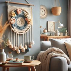 a living room filled with furniture and decor next to a wall hanging on the wall