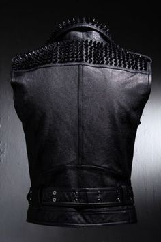 Black Leather VEST Black Studs HANDMADE Men Black Punk Silver Long Spiked Studded Leather Buttons Up Vest Black Studs and Spikes Black Leather Made to Orders Studs Spike Studded Jacket made with 100 % Genuine Top Quality Cowhide LeatherBlack StuddedHigh Quality Studs. Each securely added by hand Cropped, Vintage - Inspired / Moto / Fit0.9 to 1.0 MM Cowhide Leather used Soft Black Real LeatherAll sizes Available(Over XL Size 40$ will Charged till 4XL and above size 60$ ll be charged more)Make sur Alternative Black Vest For Fall, Alternative Black Fall Vest, Black Alternative Vest For Fall, Alternative Style Black Vest For Fall, Black Gothic Vest For Alternative Fashion, Black Punk Winter Vest, Black Punk Vest For Winter, Black Fitted Rocker Vest, Fitted Black Rocker Vest