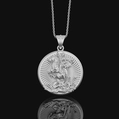 Silver Saint George Pendant - Engravable: A Timeless Symbol of Courage, Faith, and Victory Celebrate the legendary courage and unwavering faith of Saint George with our Silver Saint George Pendant, a beautifully detailed piece depicting Saint George in his iconic triumph over the dragon. Representing bravery, protection, and perseverance, this pendant is a meaningful expression of strength and spiritual devotion. With the option to personalize it with an engraving, it becomes a unique and cheris George Necklace, Saint Necklace, Spiritual Necklace, Divine Protection, Saints Medals, 30 Gifts, Saint George, 20 Gifts, Christian Jewelry