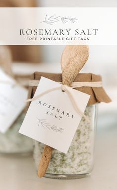 rosemary salt in a glass jar with a wooden spoon and tag on it that says rosemary salt free printable gift tags