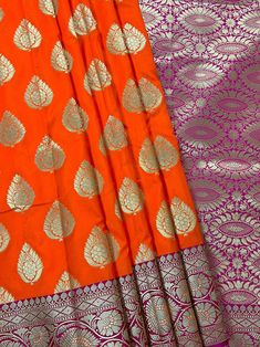 Traditional Bright Fanta Orange Banarasi Silk Saree with Pink color combination in the borders and Pallu. Buttas all over the body of the sareeSaree is super soft and easy to drape. Item : SareeColor : Bright Fanta Orange Orange with PinkBase Fabric : Banarasi Silk SareeBlouse piece : Comes with Blouse pieceBlouse material : Banarasi Silk SareeFall & Edging done (Yes/No) : Yes Disclaimer -:- Color variation is possible due to various reasons like phone or desktop setting, resolution etc. Please Orange Banarasi Silk Saree Set, Orange Banarasi Silk Handloom Dupatta, Semi-stitched Pink Banarasi Silk Saree, Yellow Handloom Banarasi Silk Pre-draped Saree, Luxury Orange Banarasi Silk Pre-draped Saree, Fanta Orange, Pink Color Combination, Men's Ethnic Wear, Saree Silk