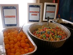 two trays filled with cereal sitting on top of a table