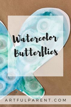 a paper butterfly with the words watercolor butterflies on it and an image of a fish