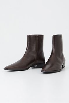 Vagabond elongated toe Nella boots in smooth dark chocolate brown leather. The nella are a dressy ankle boots with a contemporary look, featuring a slender toe shape and zipper along the shaft. Measurements from a 37: heel 31mm, shaft height 178mm, shaft width 255mm. Leather upper, tpu outsole, tencel and cotton lining, goat leather inner sole. This style is made by THUONG THANG JSC HO CHI MINH CITY, VIETNAM. 5416-001-35 PIPE AND ROW Dressy Ankle Boots, Dark Chocolate Brown, Goat Leather, Ho Chi Minh City, Ho Chi Minh, Pitcairn Islands, Turks And Caicos Islands, Style Ideas, Trinidad And Tobago