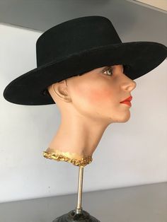 "Hard structure black felt hat. Seems to be an early hat, maybe as early as the 1930's. In good vintage condition. Measurements are: Circumference21\" Dome4\" Brim3\" Feel free to convo me with any further questions. Thank you for your interest." Black Flat Crown Fedora For Kentucky Derby, Vintage Black Adjustable Fedora, Black Top Hat With Flat Crown For Kentucky Derby, Black Top Hat For Kentucky Derby With Flat Crown, Black Adjustable Vintage Fedora, Black Curved Brim Felt Hat For Kentucky Derby, Black Felt Hat With Short Brim, One Size, Black Flat Brim Felt Hat For Kentucky Derby, Vintage Black Costume Hat With Flat Brim